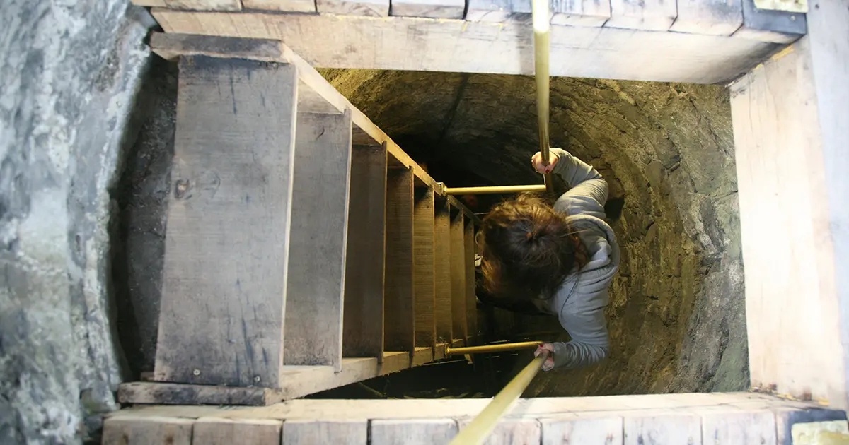 Climbing the Round Tower at St. Canice's Cathedral, offering breathtaking views of Kilkenny city